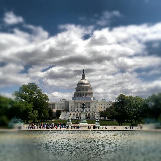 view of the us capitol building through a wide panorama lens