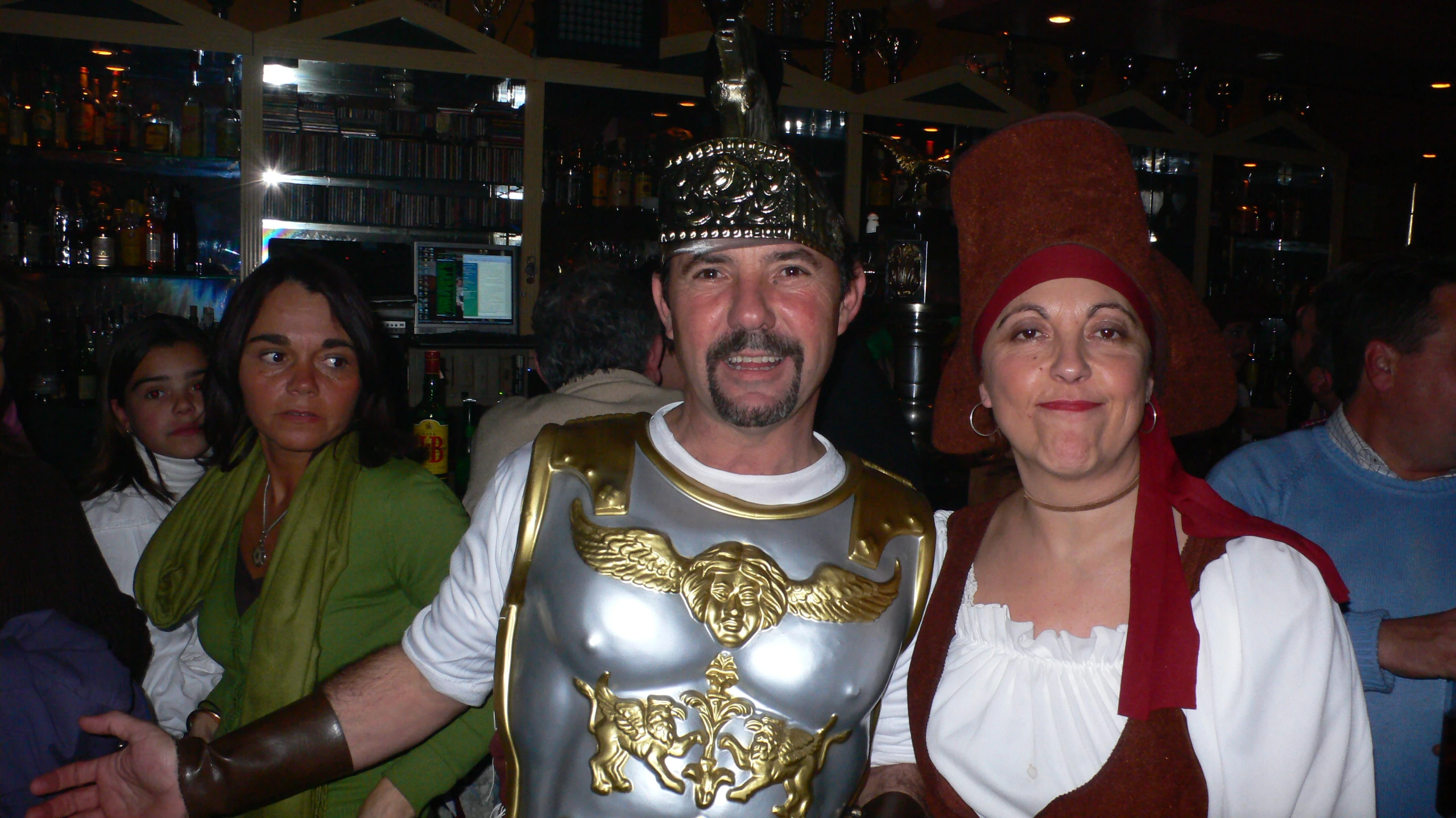 man wearing an armor while standing with a woman