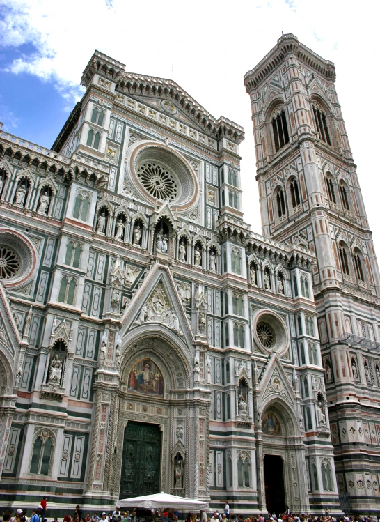 a large cathedral with two towers and a huge clock