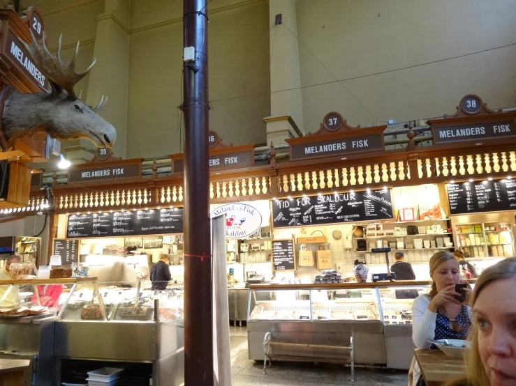 a large taxidermy on display inside of a building