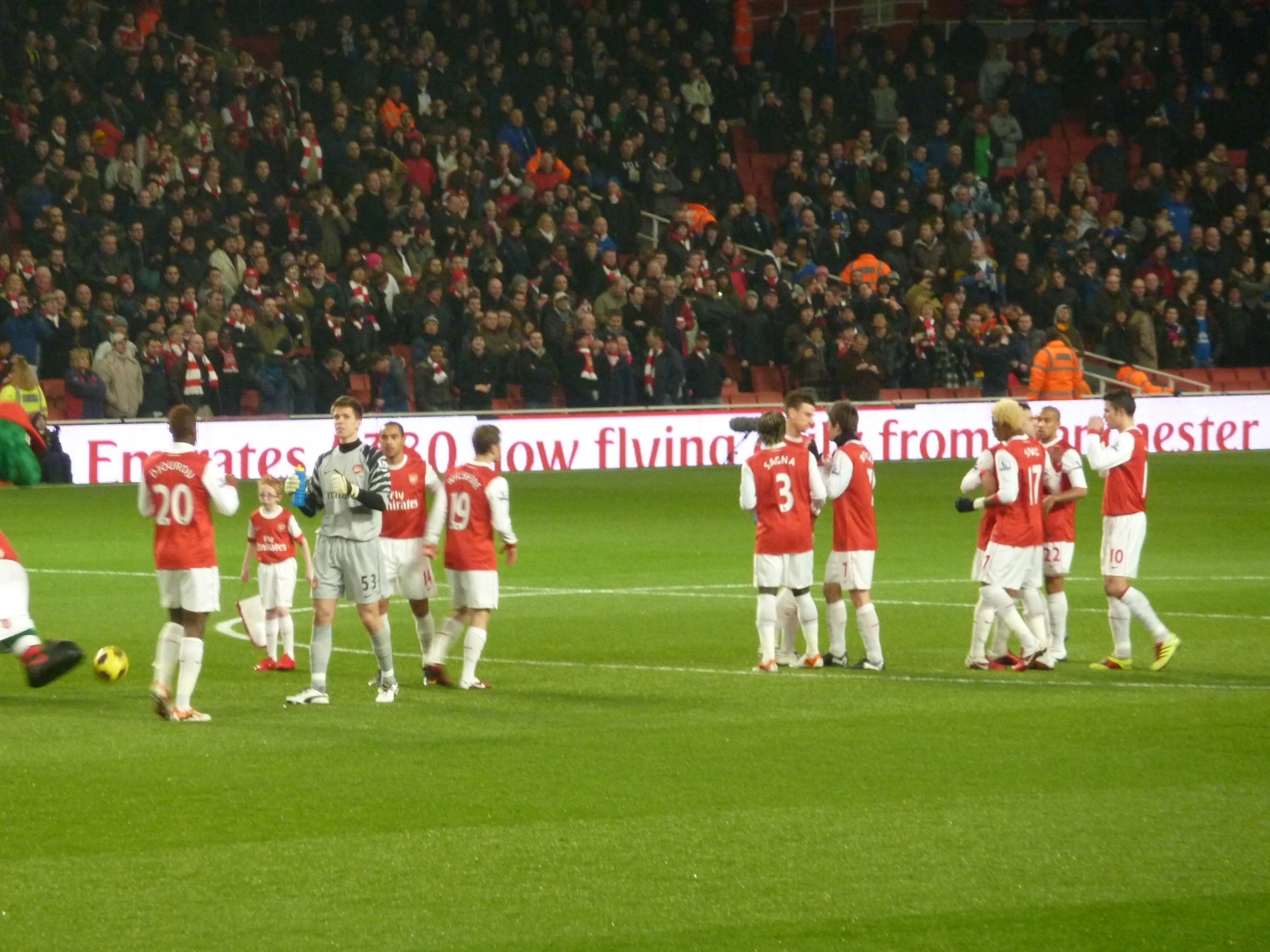 a soccer team celetes with a group po