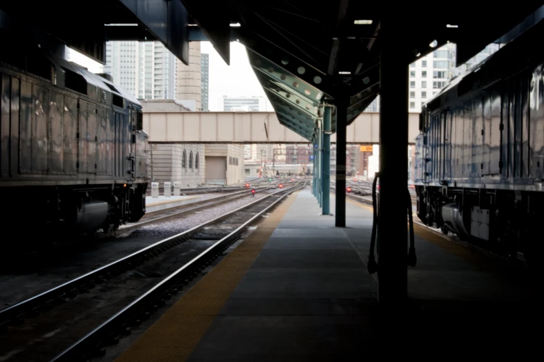 the train tracks are running parallel to one another