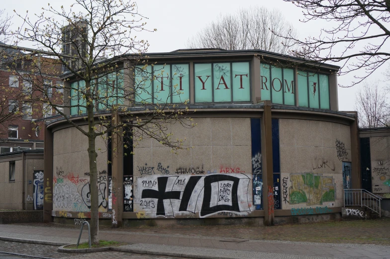 an abandoned building with graffiti on it