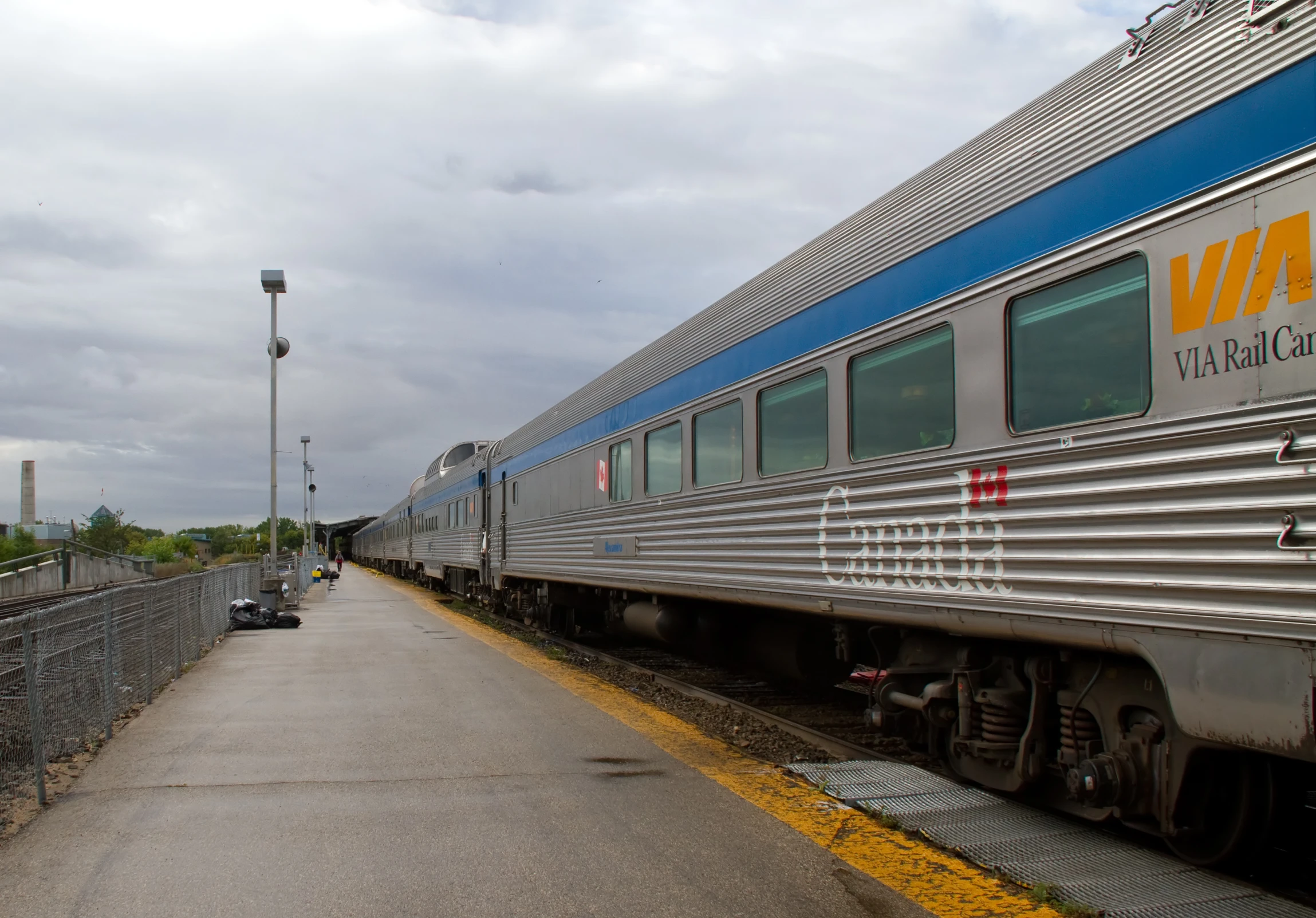 a train stopped on the tracks to allow passengers