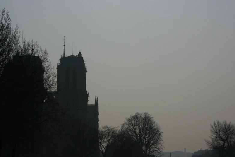 the building on the left has an enormous spire