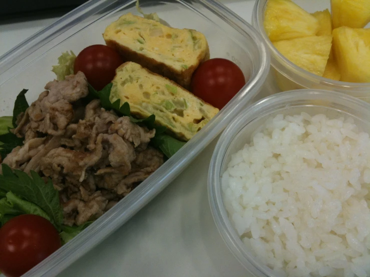 a meal consisting of meat and rice with broccoli