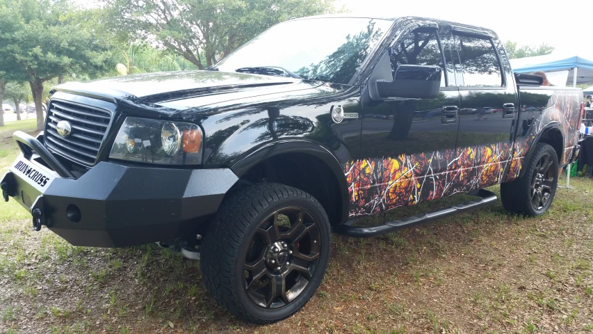 a pickup truck with some paint job