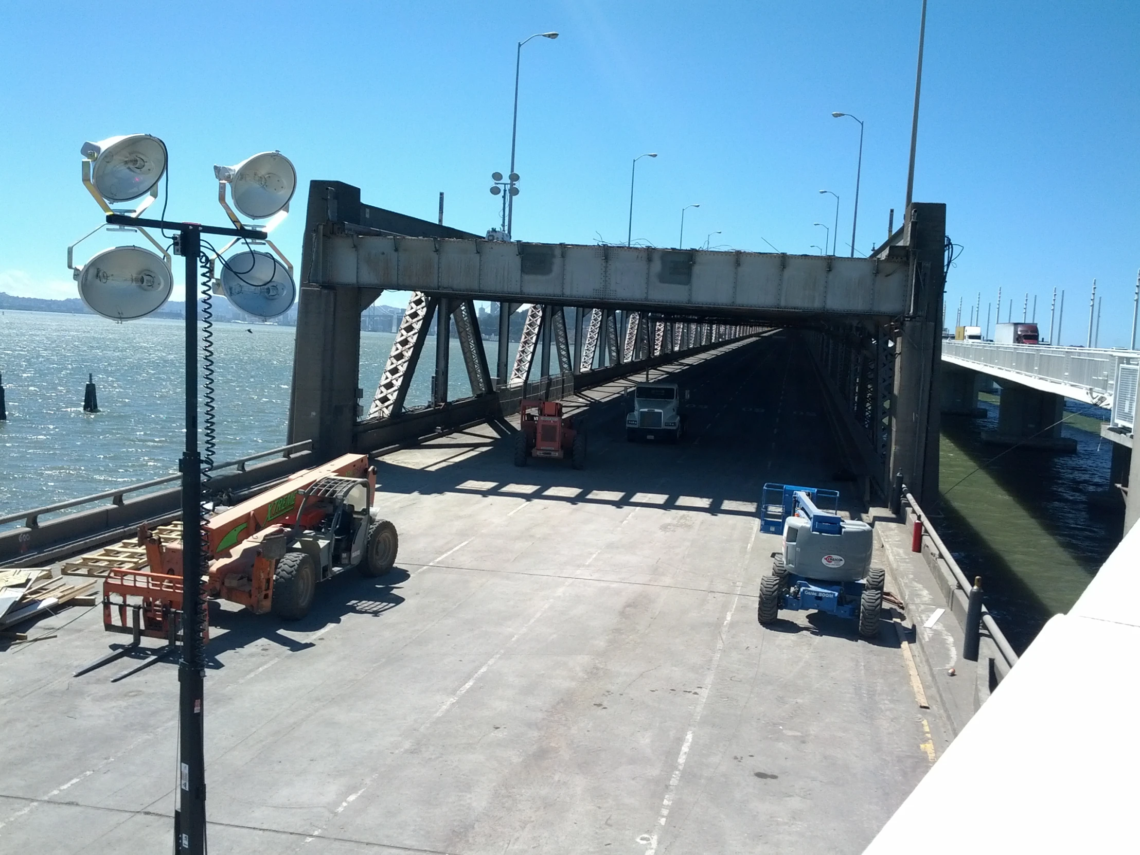 a bridge with several street lights on it