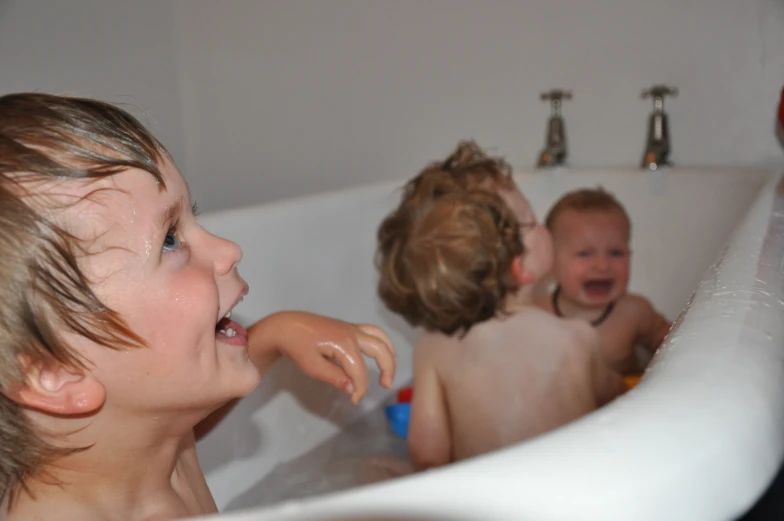 a bunch of s in the tub with each other