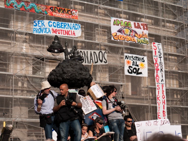 a group of people standing in front of a building