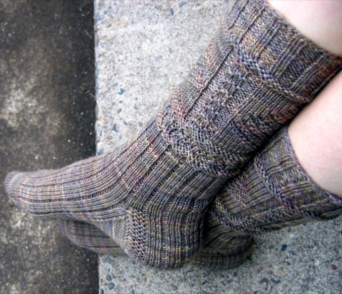 close up s of the socks and a person's legs