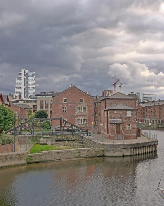 view of buildings next to a large body of water