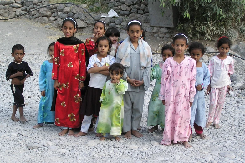 a group of children and their families all in clothes