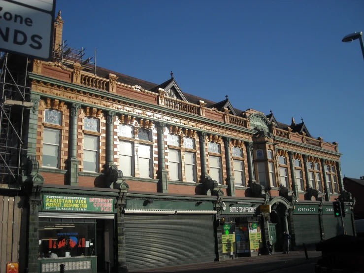 a large building with several windows on the top