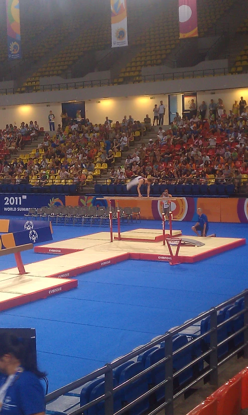 a wrestling match being played in a stadium