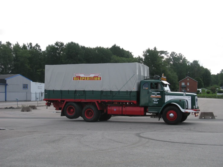 a large truck is parked in the parking lot