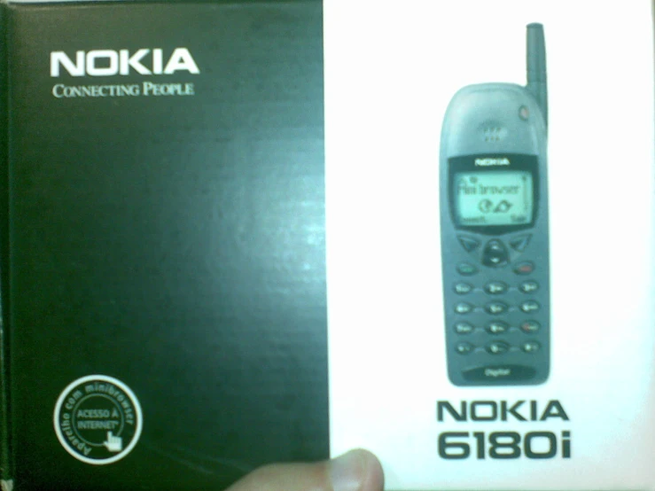 the box for the nokia phone is in someones hand