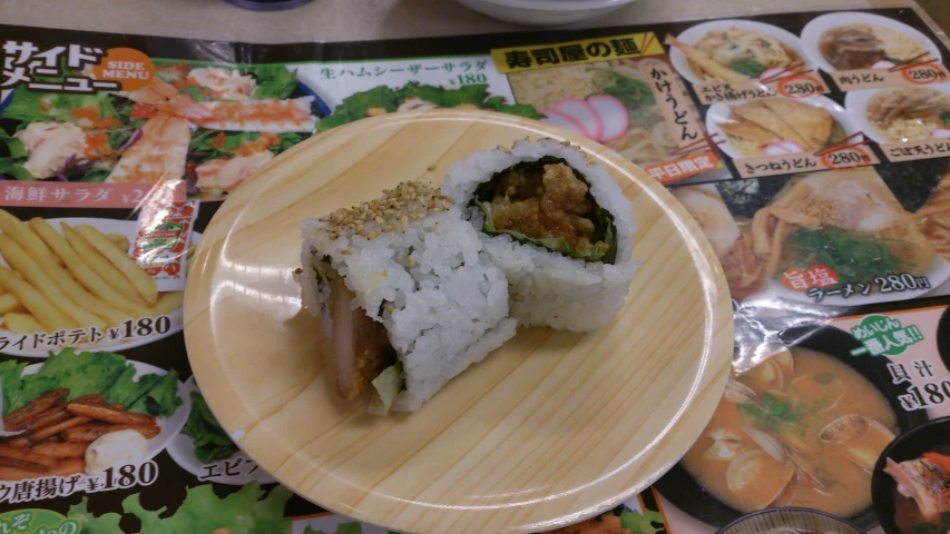 a half eaten sushi is shown on a plate