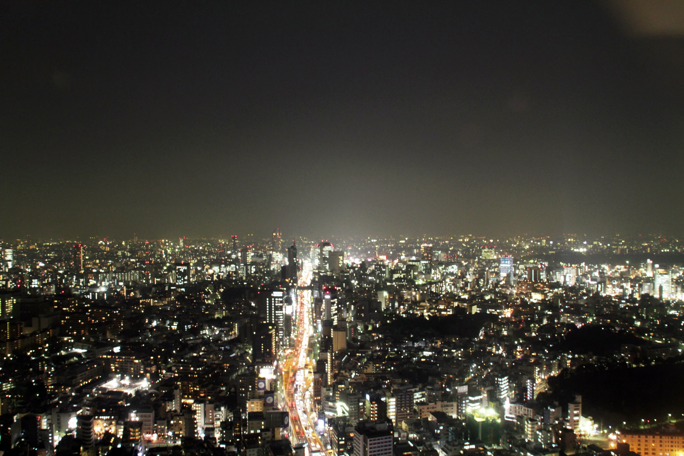 night time city skyline view with street lights