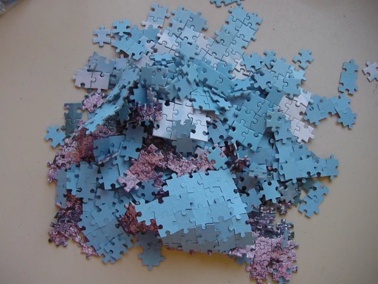 a group of jigsaw pieces with the missing pieces