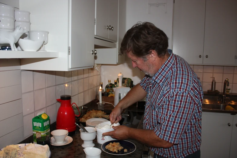 a man making food with an odd looking face