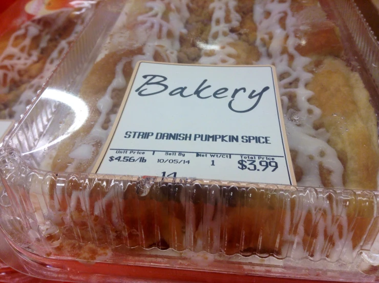 a pastry is in a plastic tray on a table