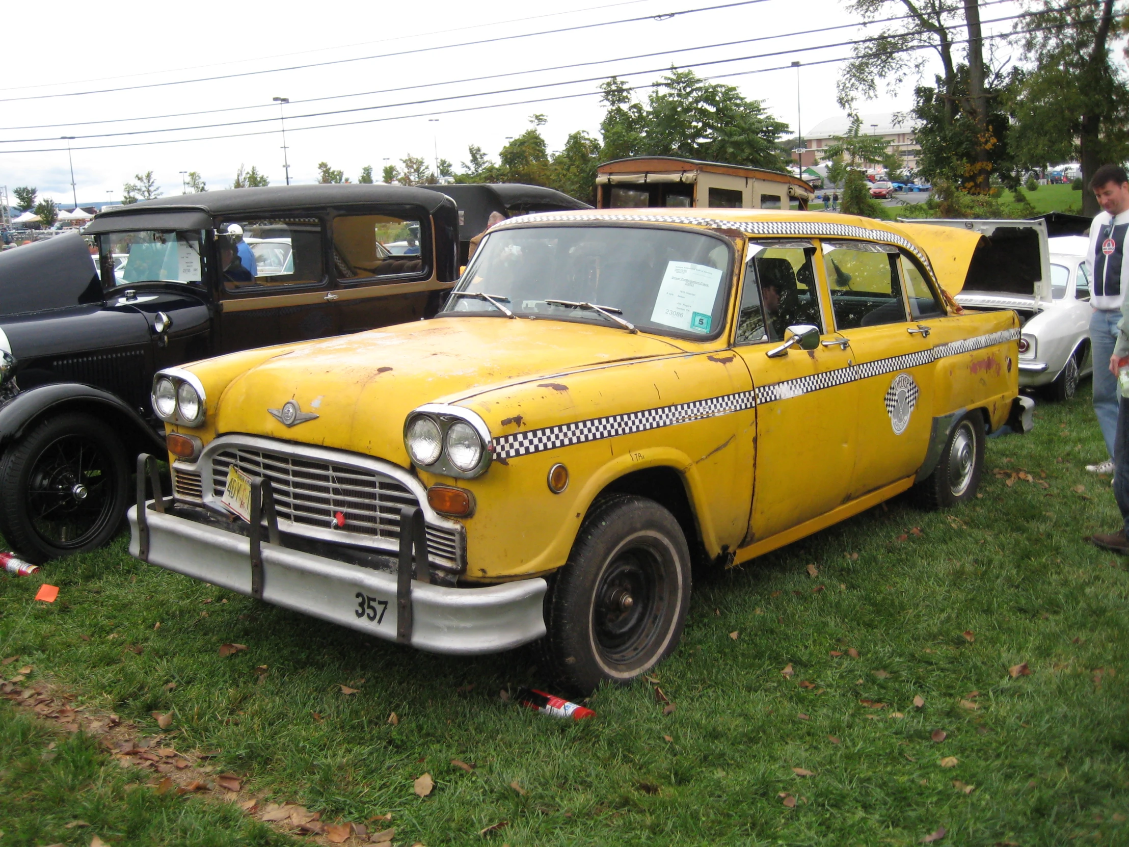 several cars are parked next to one another