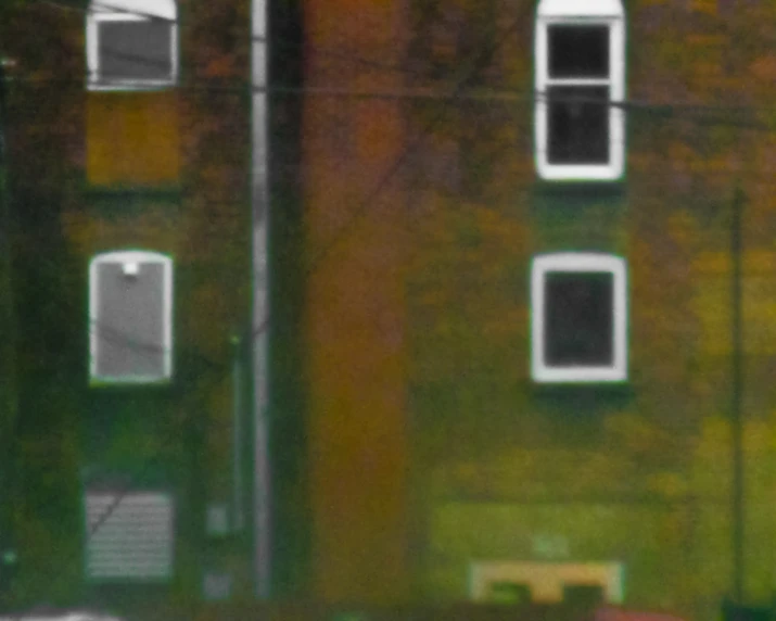 a window on a building near a traffic light