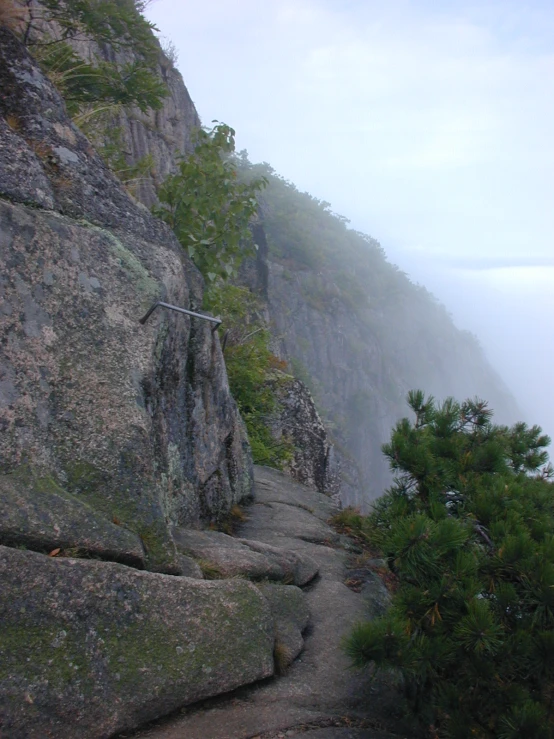 the trail is made of rock and is very foggy