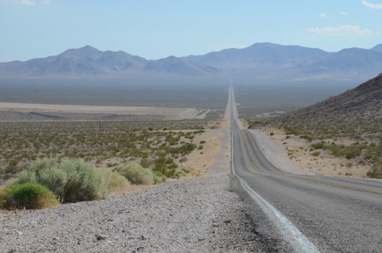 an empty road in the middle of nowhere