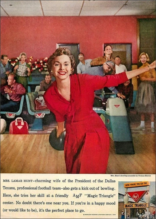 a woman in a red dress bowling with others