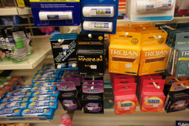 a retail display with colorful medicine bottles on the shelf