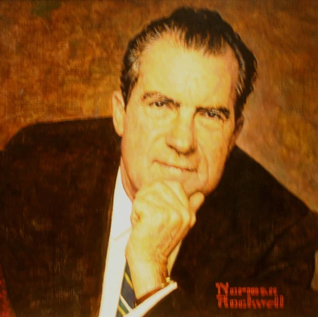 a portrait of a man wearing a suit and tie