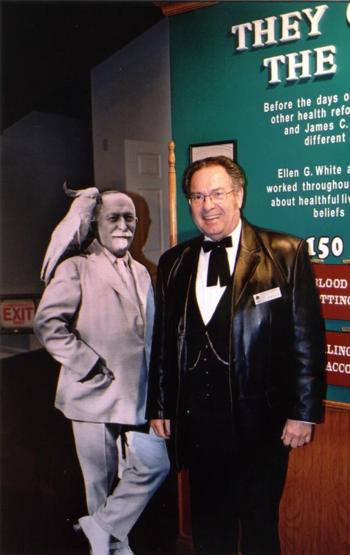 two men are posing in front of a po of themselves