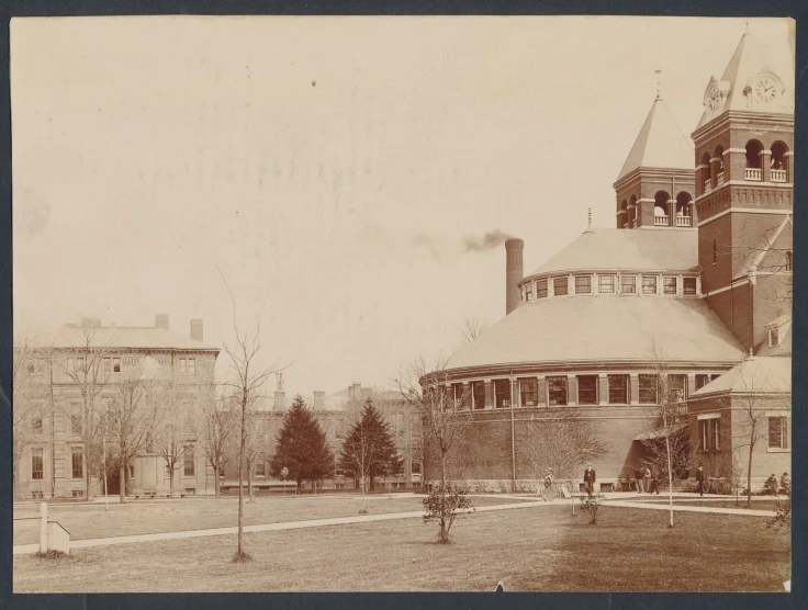 a sepia - toned po of a large brick building