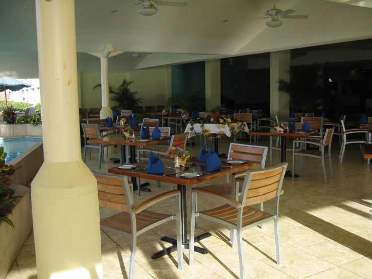 a restaurant is set up with many chairs and tables