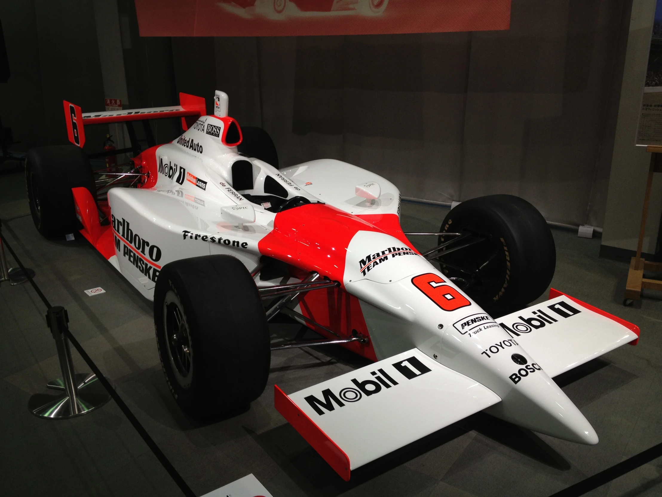 the front of a racing car is shown on display
