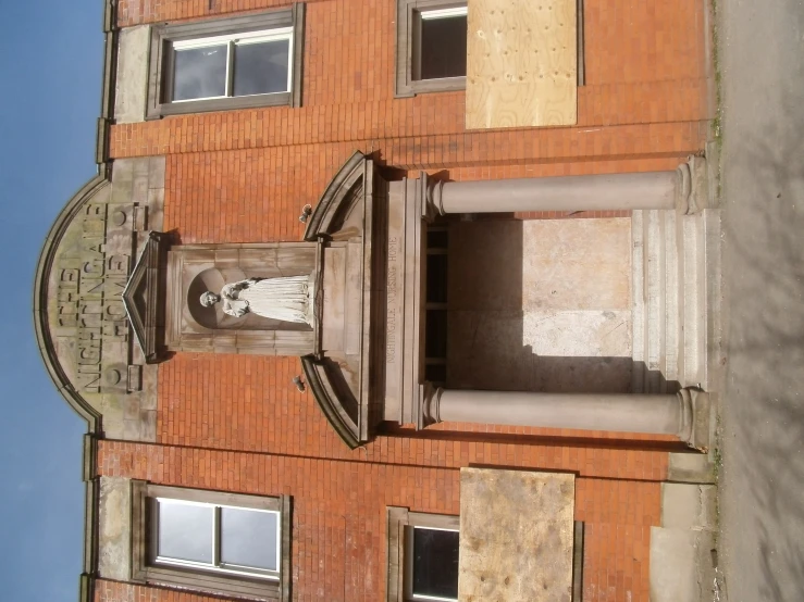 the bottom of a building is made out of brick