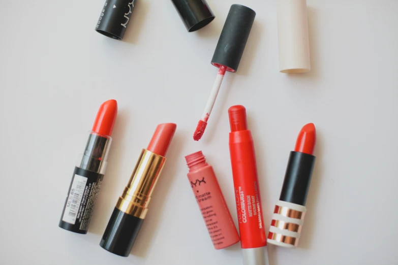 various lipstick types laid out on a table