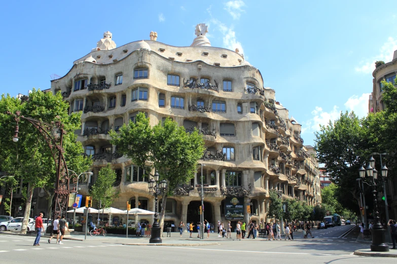 a building on the corner of a street in barcelona