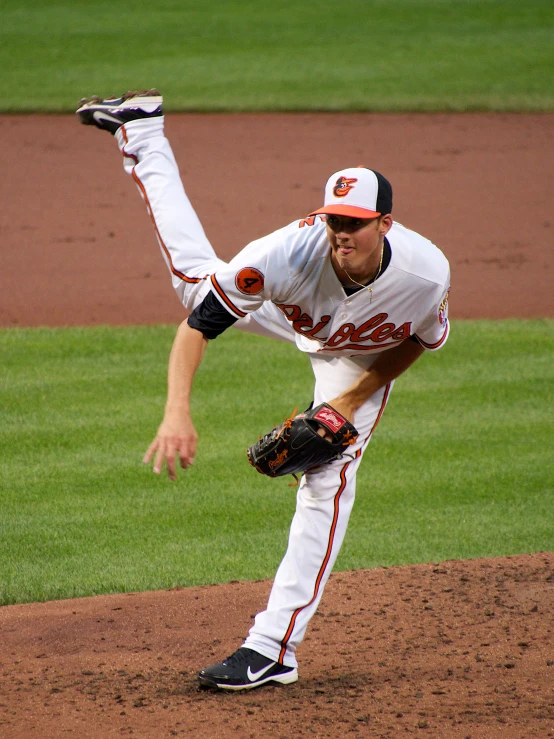 a professional baseball player throwing the ball during a game