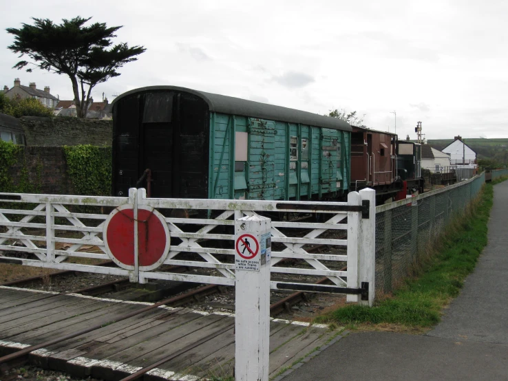 the old train car is being repaired on the tracks