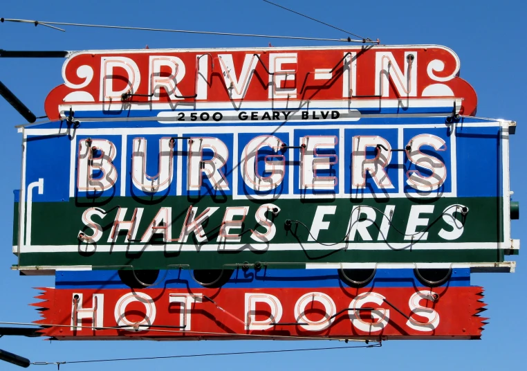 a sign advertising a  dog store and burgers