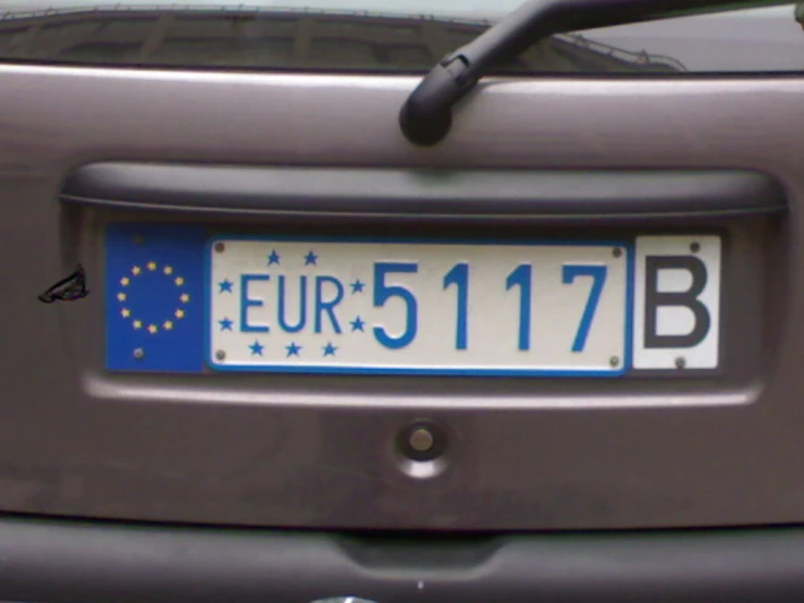 a car with an euro plate that reads 5 11 b