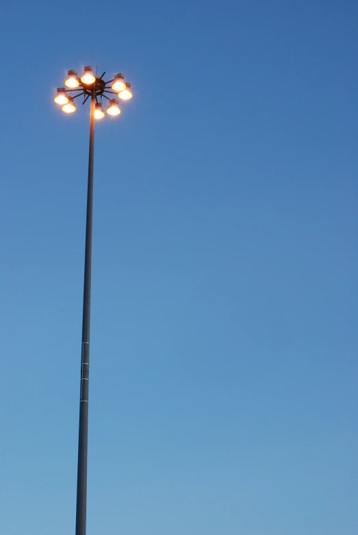 a large street light on top of a metal pole