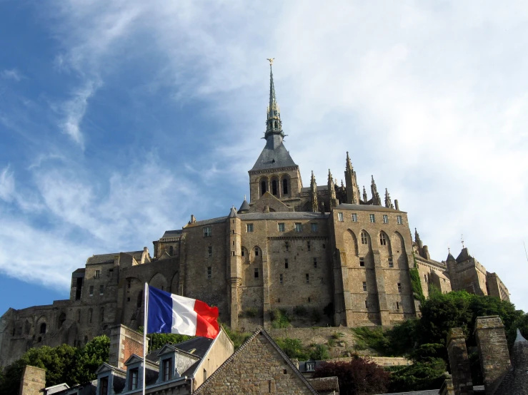 a castle with a flag on top of it