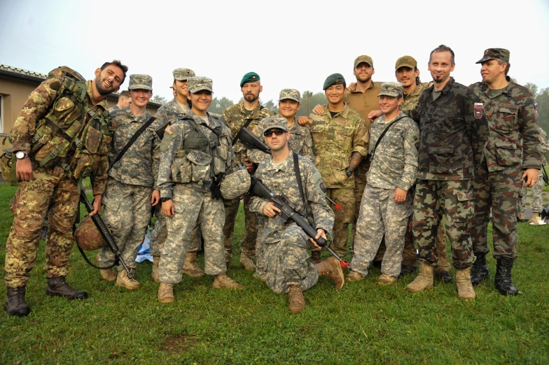 a group of military men posing for a picture