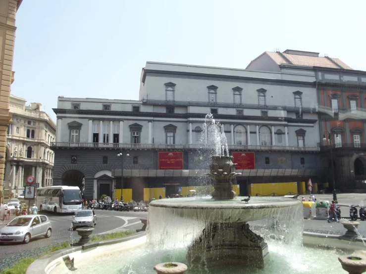 there is a fountain in the middle of the town