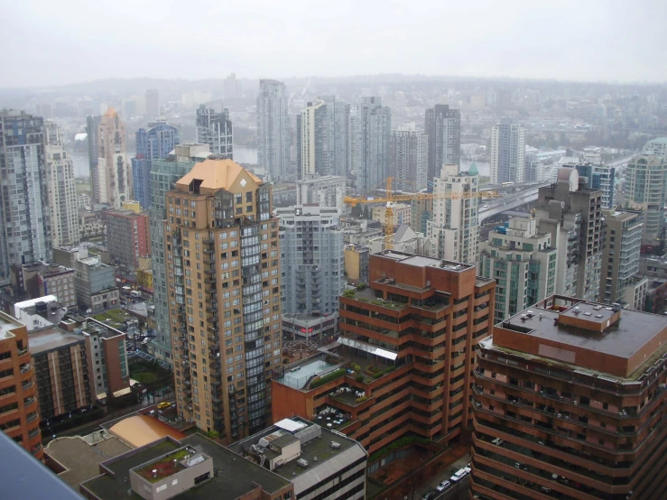 some tall buildings in a very wide area