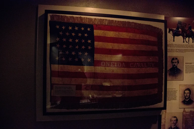 a large flag is hanging up on the wall